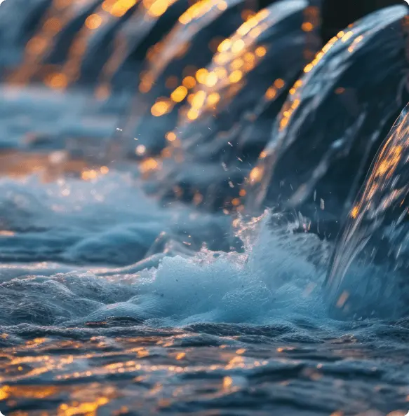 water flowing water with sunlight shining through.